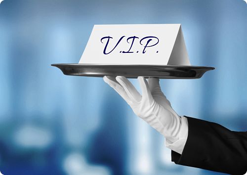 Seller Services for Single Family Homes in Silicon Valley Waiter's gloved hand holding tray with card that says "V I P"