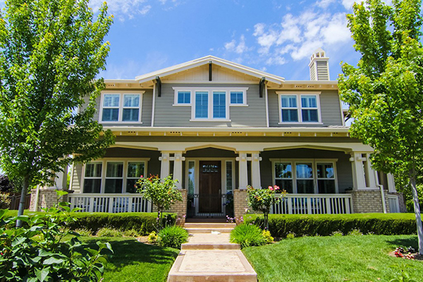 Luxurious homefront with brick walkway