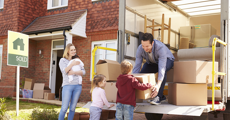Seller’s Guide for Silicon Valley CA Homes Family gathered outside of moving van, helping father carry in boxes from truck