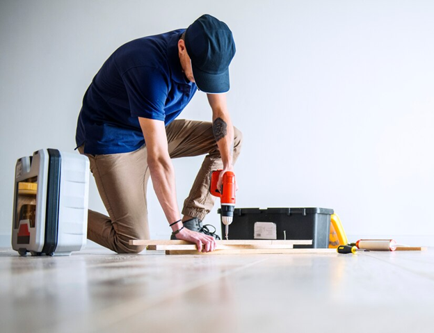 Man Fixing Floor