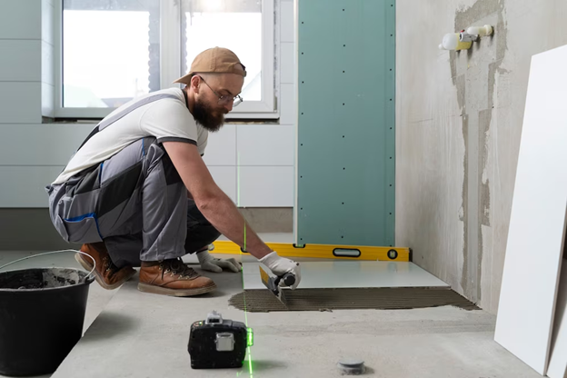 Man Tiling Bathroom